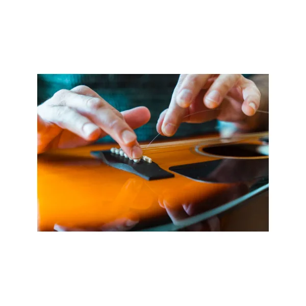 Changer les cordes de guitare classique, folk ou électrique
